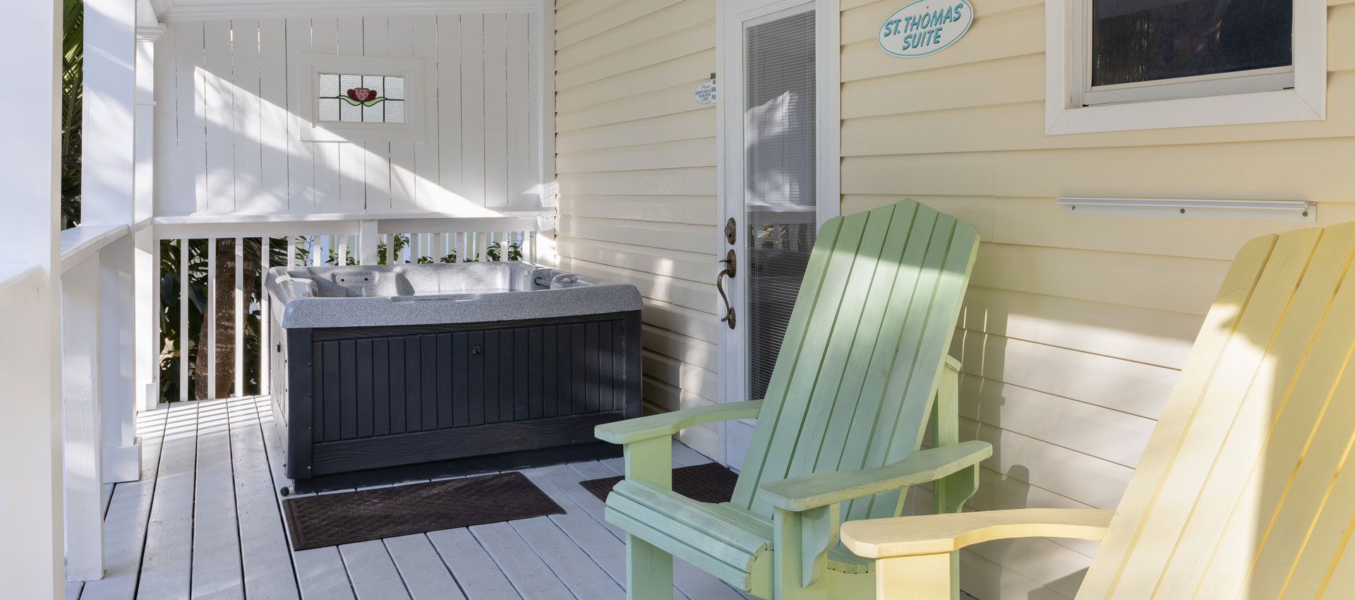 Private Jacuzzi on St Thomas Suite patio with chairs